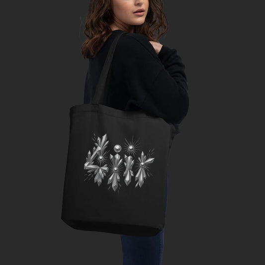 4iir BULLETPROOF black organic cotton tote bag with metallic crystal graphic design carried over the shoulder