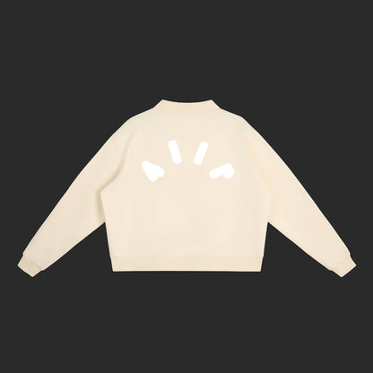 Back view of a 4iir Pink Cloud sweater in cream with a white minimalist logo graphic on the upper back.