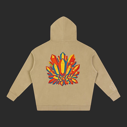 4iir Crystal Lava hoodie in beige with a vibrant red, yellow, and blue crystal graphic on the back.