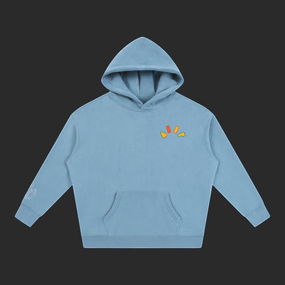 4iir Crystal Lava hoodie in dusty blue with a small colorful lava graphic on the chest and sleeve detail.