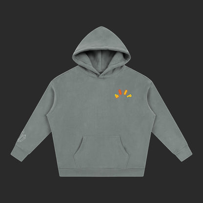 4iir Crystal Lava hoodie in grey with a small colorful lava graphic on the chest and crystal print on the sleeve.