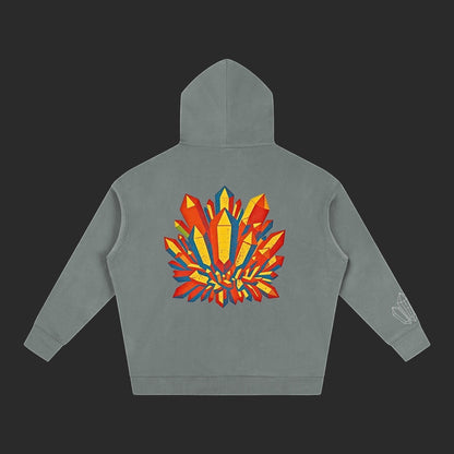 4iir Crystal Lava hoodie in grey with a vibrant red and yellow crystal graphic on the back and sleeve detail.