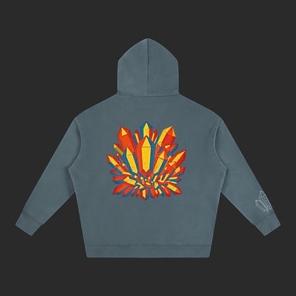 4iir Crystal Lava hoodie in grey with a vibrant red and yellow crystal graphic on the back and sleeve detail.
