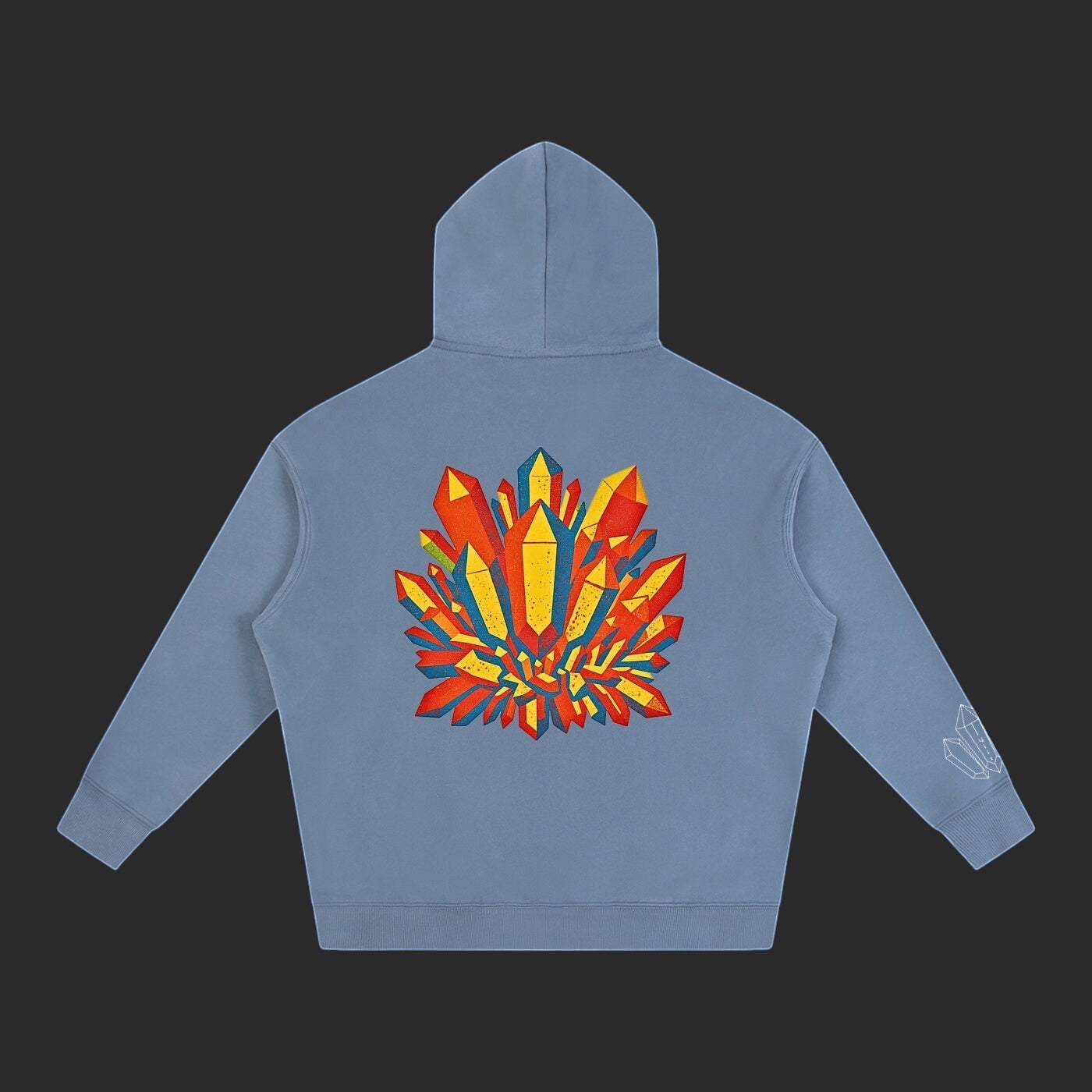 4iir Crystal Lava hoodie in dusty blue with a vibrant red and yellow crystal graphic on the back and sleeve detail.