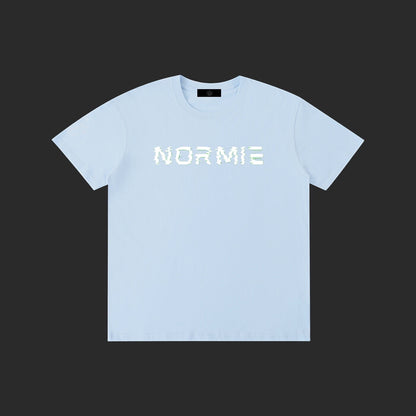 4iir light blue cotton Normie T-shirt with white glitch-style text graphic on the chest.