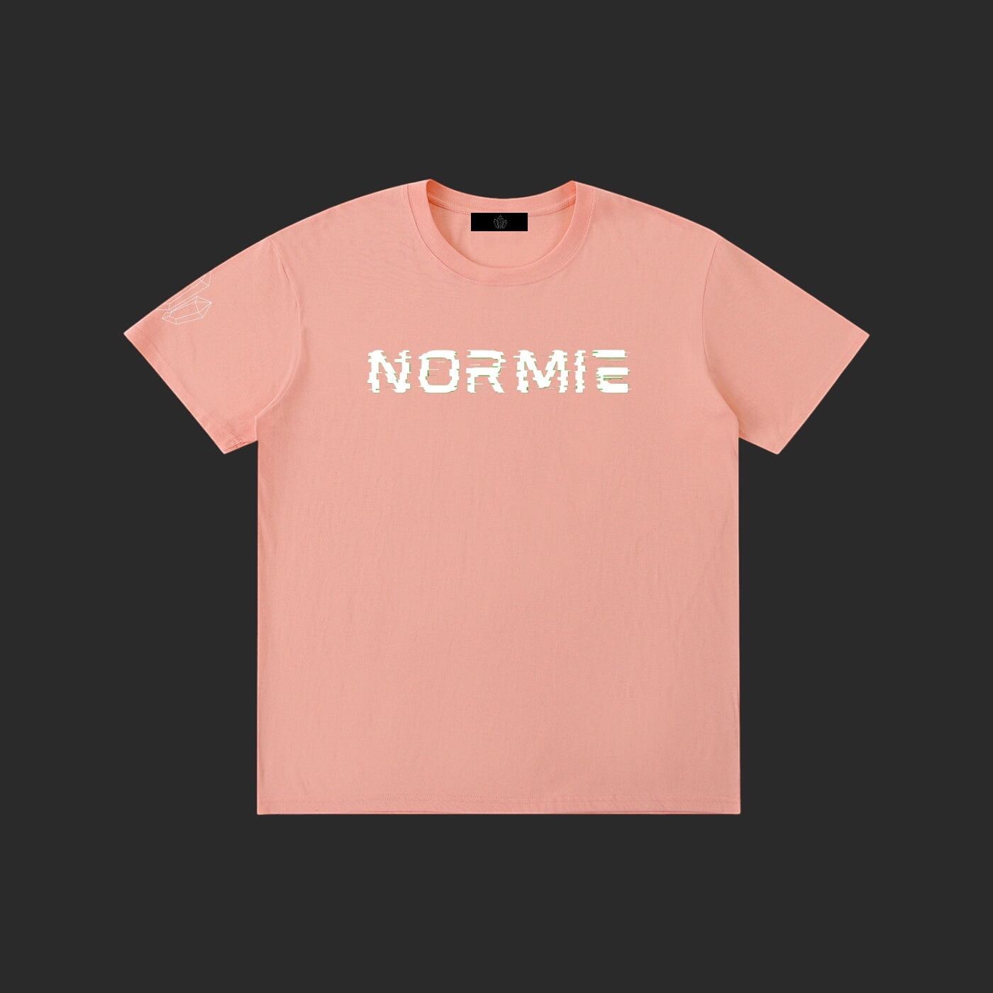 4iir Normie T-shirt in peach cotton with white glitch-style text graphic on chest and small sleeve detail.
