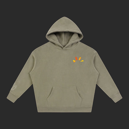 4iir Crystal Lava hoodie in olive green with a small colorful lava graphic on the chest and sleeve print.