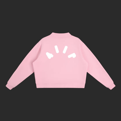 4iir Pink Cloud sweater in light pink with white graphic print on the back, featuring a ribbed collar and cuffs.