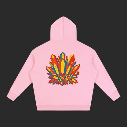 4iir Crystal Lava hoodie in light pink featuring a vibrant back graphic of colorful geometric crystals.