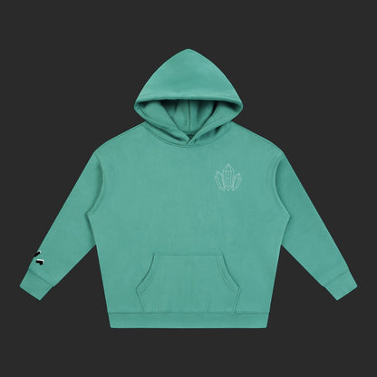 4iir Revenge hoodie in teal with a small white crystal graphic on the chest and a kangaroo pocket.